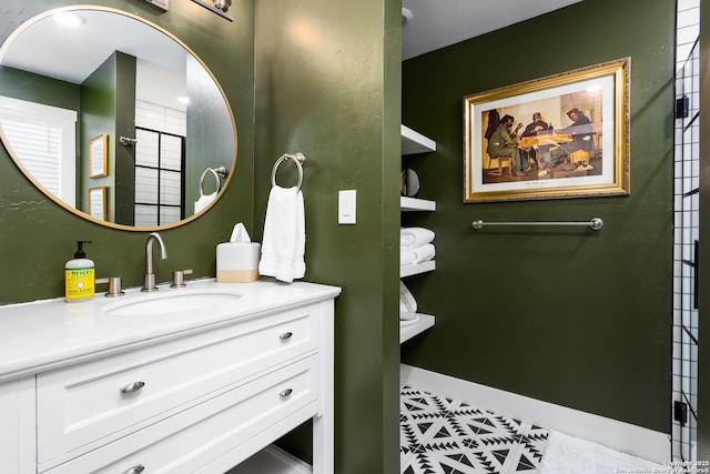 bathroom featuring vanity and tile patterned flooring