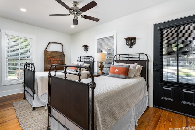 212 Peach, Fredericksburg, TX 78624 - bedroom with recessed lighting, wood finished floors, baseboards, and ceiling fan