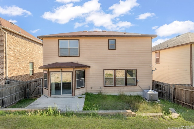 13219 Loma Sierra, San Antonio, TX 78233 - rear view of property featuring a patio area, a fenced backyard, and central AC