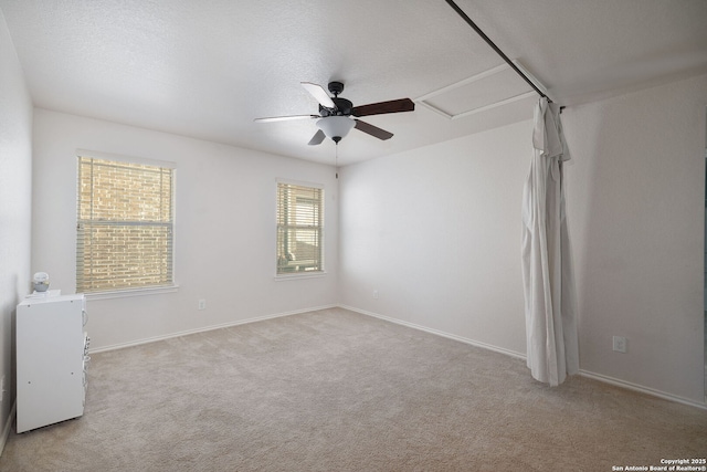 13219 Loma Sierra, San Antonio, TX 78233 - carpeted spare room featuring ceiling fan, a wealth of natural light, and baseboards