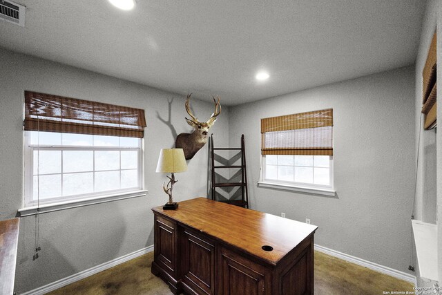 office space featuring recessed lighting, visible vents, and baseboards