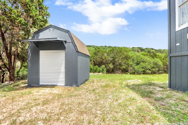 630 Nelson, Canyon Lake, TX 78133 - view of shed with a forest view