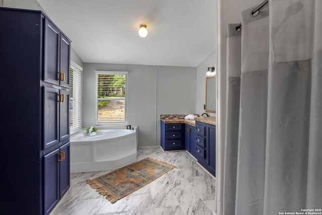 630 Nelson, Canyon Lake, TX 78133 - bathroom with a garden tub, marble finish floor, vanity, and a shower with shower curtain