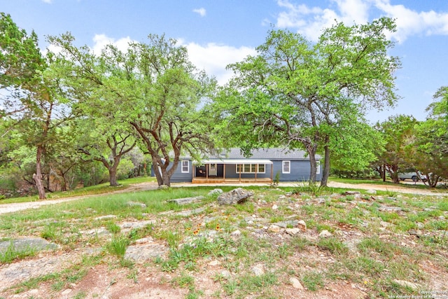 630 Nelson, Canyon Lake, TX 78133 - view of yard featuring covered porch