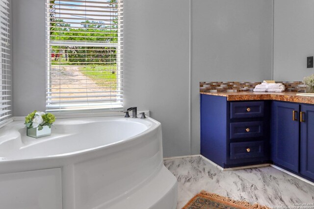630 Nelson, Canyon Lake, TX 78133 - bathroom featuring a garden tub and vanity