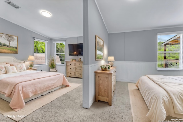 630 Nelson, Canyon Lake, TX 78133 - bedroom featuring lofted ceiling, a wainscoted wall, multiple windows, and visible vents
