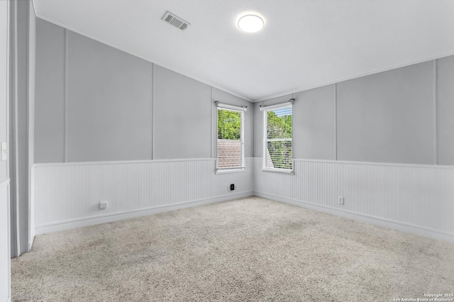 630 Nelson, Canyon Lake, TX 78133 - empty room featuring wainscoting, visible vents, and carpet