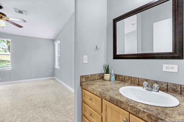 630 Nelson, Canyon Lake, TX 78133 - bathroom with lofted ceiling, plenty of natural light, a ceiling fan, and visible vents