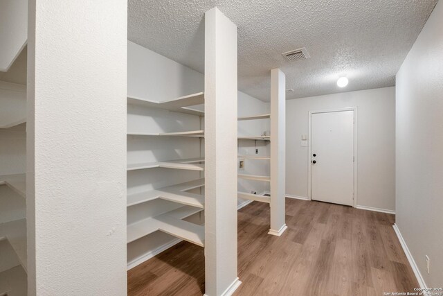 storage area featuring visible vents