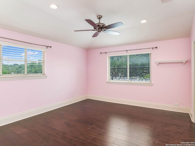 spare room with wood finished floors, baseboards, recessed lighting, and ceiling fan