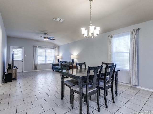 542 Snowy Egret, San Antonio, TX 78253 - dining room with ceiling fan with notable chandelier, vaulted ceiling, baseboards, and visible vents