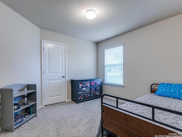 542 Snowy Egret, San Antonio, TX 78253 - carpeted bedroom featuring baseboards and a textured ceiling