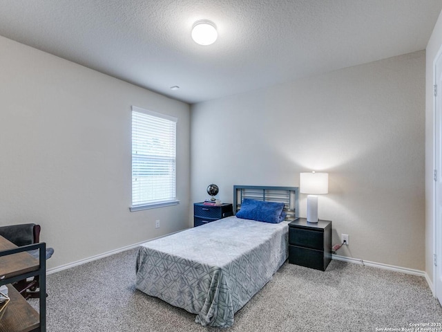 542 Snowy Egret, San Antonio, TX 78253 - carpeted bedroom with baseboards and a textured ceiling