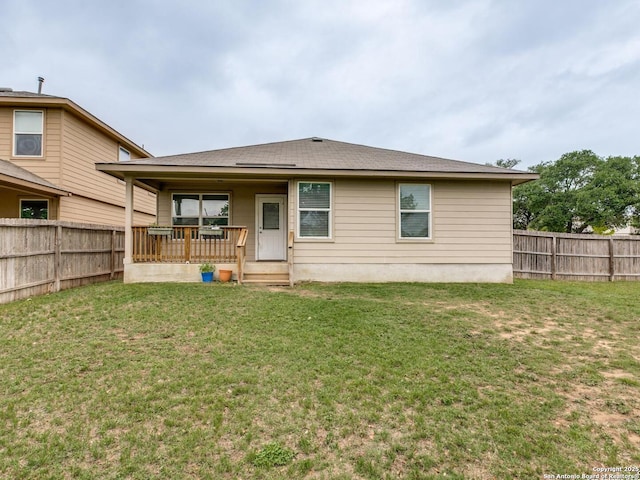 542 Snowy Egret, San Antonio, TX 78253 - rear view of property with a fenced backyard, a yard, and covered porch
