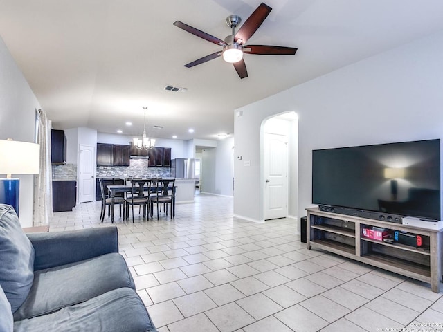 542 Snowy Egret, San Antonio, TX 78253 - living area featuring light tile patterned floors, recessed lighting, baseboards, and ceiling fan with notable chandelier