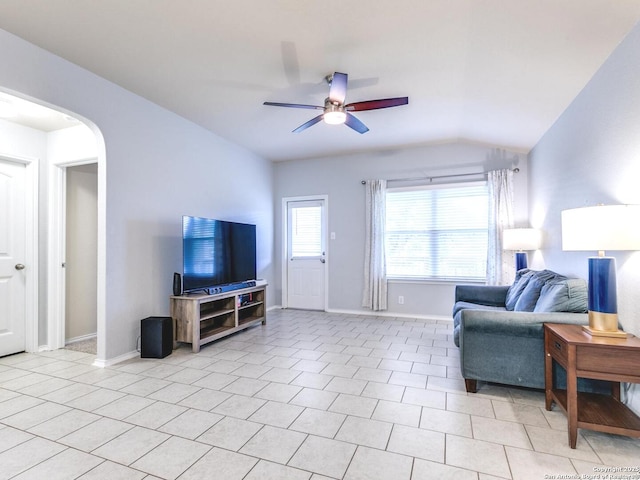 542 Snowy Egret, San Antonio, TX 78253 - living area featuring ceiling fan, arched walkways, vaulted ceiling, and baseboards
