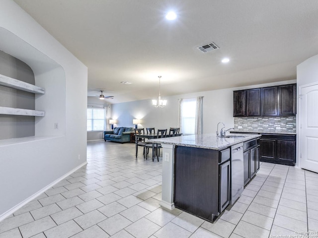 542 Snowy Egret, San Antonio, TX 78253 - kitchen with a sink, open floor plan, visible vents, backsplash, and dishwasher