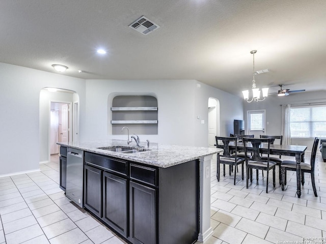 542 Snowy Egret, San Antonio, TX 78253 - kitchen featuring arched walkways, light tile patterned floors, and a sink