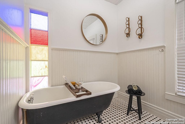 356 Kessler, New Braunfels, TX 78130 - bathroom featuring a freestanding bath and wainscoting