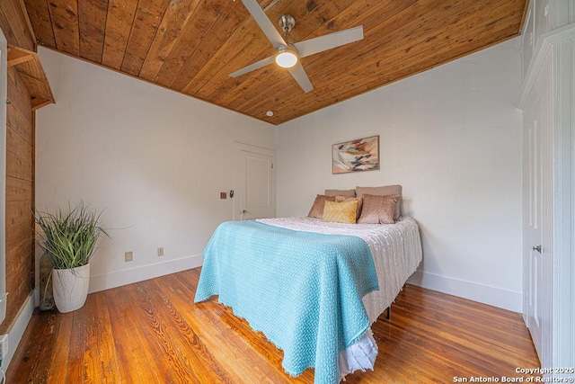 356 Kessler, New Braunfels, TX 78130 - bedroom with wooden ceiling, baseboards, wood finished floors, and ceiling fan