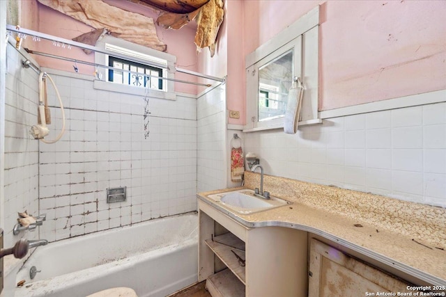 2115 Leal, San Antonio, TX 78207 - full bathroom with backsplash, shower / bath combination, and vanity