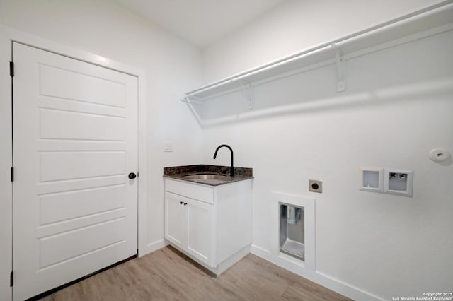 laundry area with a sink, light wood-type flooring, baseboards, electric dryer hookup, and washer hookup