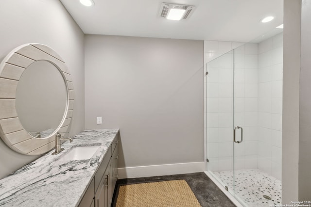 148 Lakecreek, New Braunfels, TX 78130 - full bath with recessed lighting, visible vents, vanity, baseboards, and a stall shower