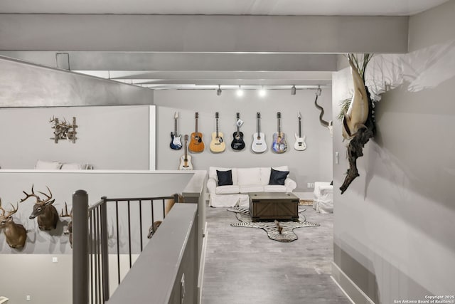 148 Lakecreek, New Braunfels, TX 78130 - living area featuring wood finished floors and baseboards