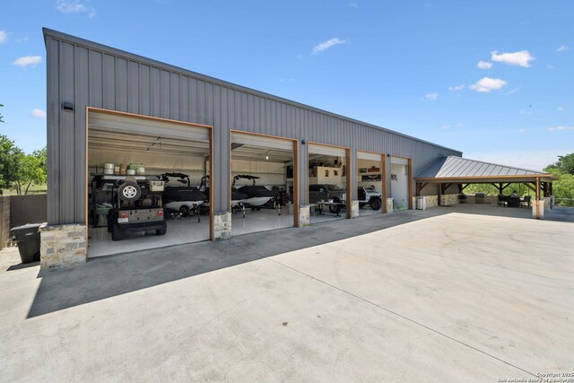 148 Lakecreek, New Braunfels, TX 78130 - exterior space featuring driveway and a detached garage