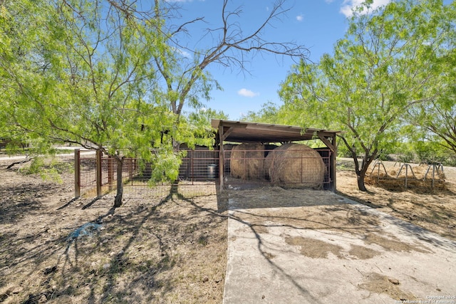 148 Lakecreek, New Braunfels, TX 78130 - exterior space with an outdoor structure and fence