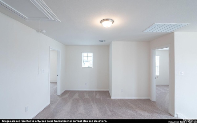 153 Taylor Way, San Antonio, TX 78253 - carpeted empty room featuring attic access, baseboards, and visible vents