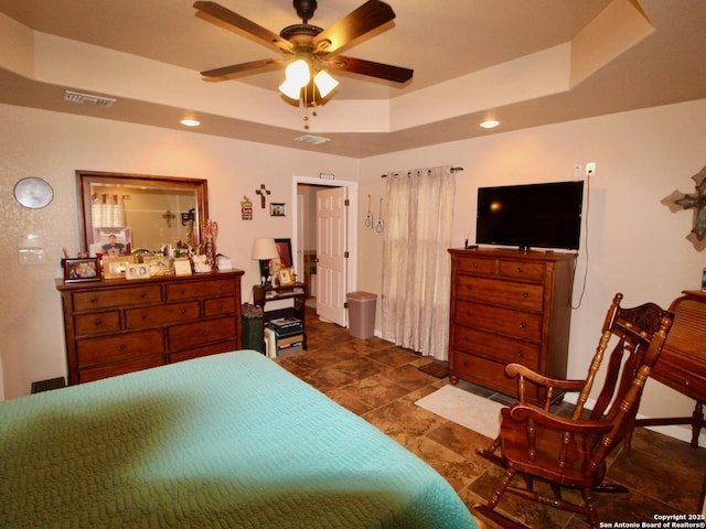 12365 Rudolph Rd, Atascosa, TX 78002 - bedroom featuring a tray ceiling, visible vents, and recessed lighting