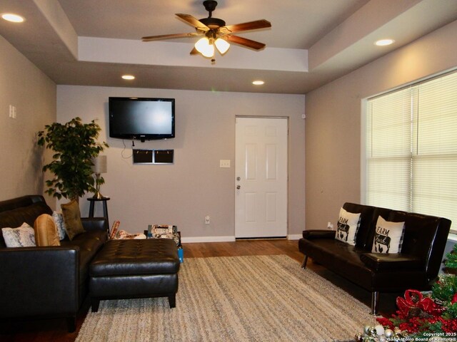 12365 Rudolph Rd, Atascosa, TX 78002 - living room featuring a ceiling fan, a tray ceiling, and recessed lighting
