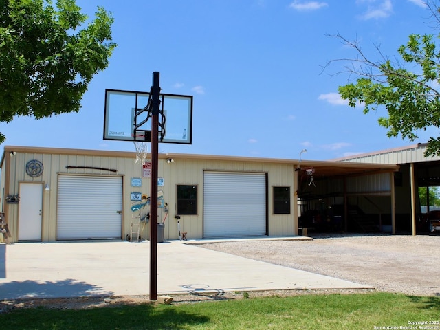12365 Rudolph Rd, Atascosa, TX 78002 - exterior space featuring an outdoor structure, driveway, and an outbuilding