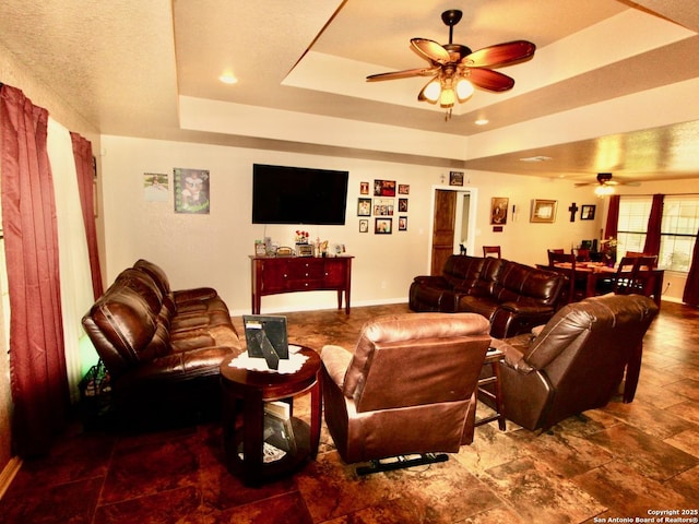 12365 Rudolph Rd, Atascosa, TX 78002 - living room with a raised ceiling and ceiling fan