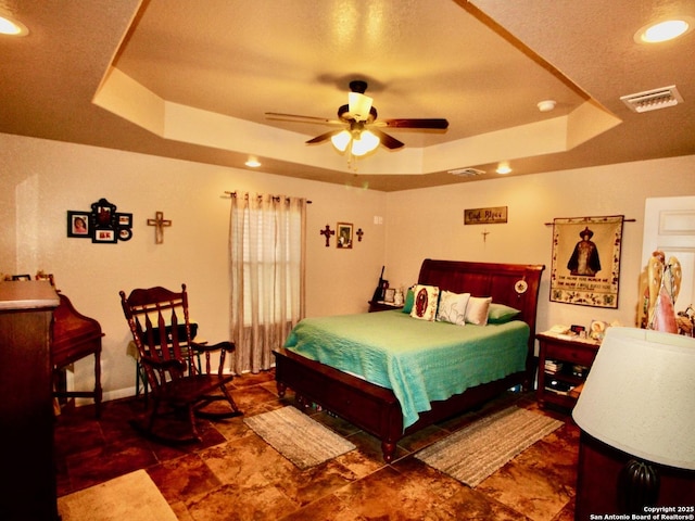 12365 Rudolph Rd, Atascosa, TX 78002 - bedroom featuring recessed lighting, a raised ceiling, and visible vents
