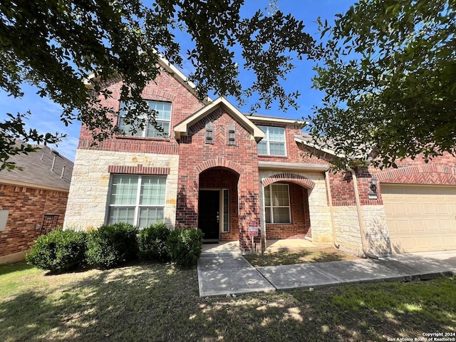 3727 Retreat Run, San Antonio, TX 78253 - traditional-style house featuring brick siding, stone siding, and a garage