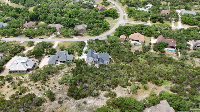 birds eye view of property with a residential view