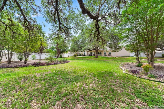 108 County Road 4325, Hondo, TX 78861 - view of yard featuring a fenced backyard