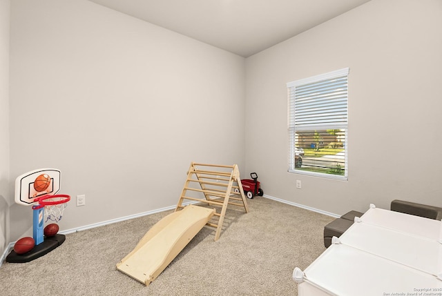 bedroom featuring baseboards and carpet floors