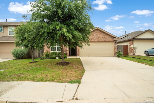 2631 Indian Frst, San Antonio, TX 78244 - view of front of property featuring fence, a front lawn, concrete driveway, brick siding, and a garage