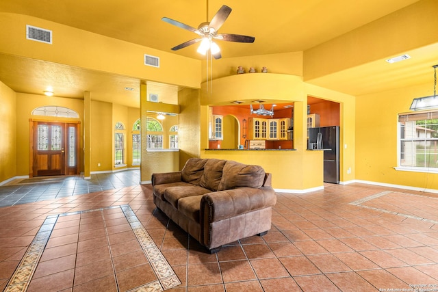 12037 Poinciana, San Antonio, TX 78245 - living area featuring baseboards, visible vents, and ceiling fan