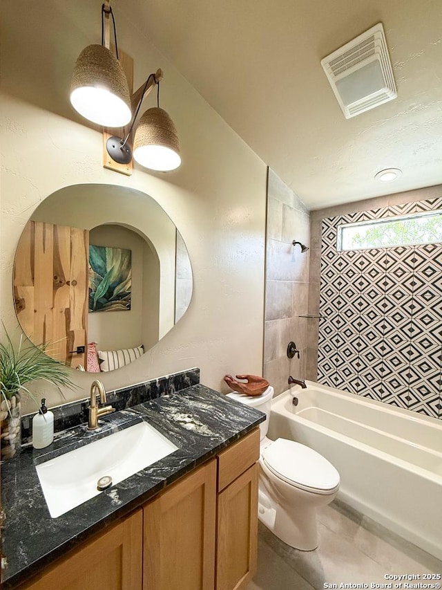 full bathroom with vanity, shower / tub combination, toilet, tile patterned flooring, and visible vents