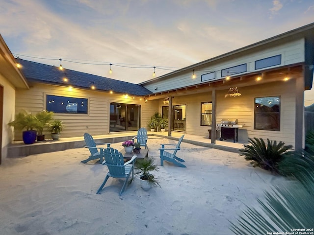 rear view of house with a patio area