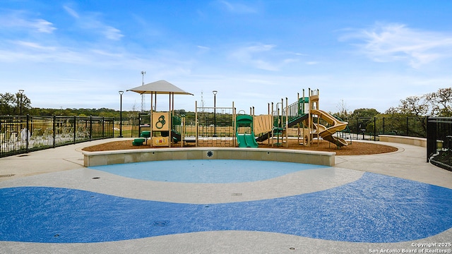 community playground featuring fence