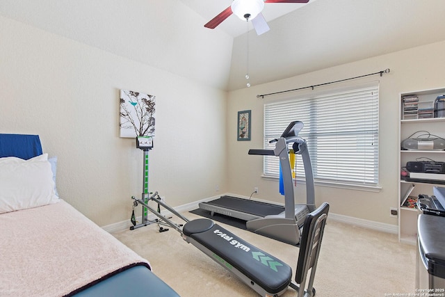 exercise area featuring light colored carpet, lofted ceiling, a ceiling fan, and baseboards