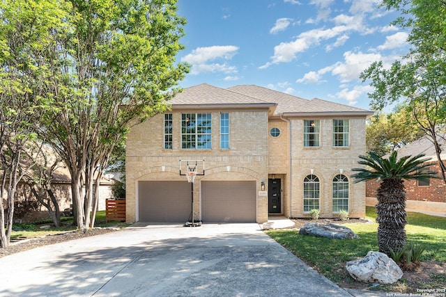 21707 Beaver Bnd, San Antonio, TX 78258 - traditional-style house with brick siding, driveway, a shingled roof, and a garage