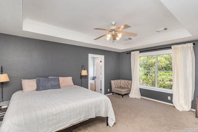 21707 Beaver Bnd, San Antonio, TX 78258 - bedroom with carpet floors, ornamental molding, a tray ceiling, and visible vents