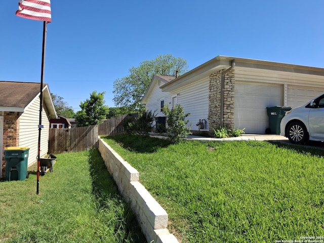 7722 Village Oaks Dr, Live Oak, TX 78233 - view of side of property featuring a garage and stone siding