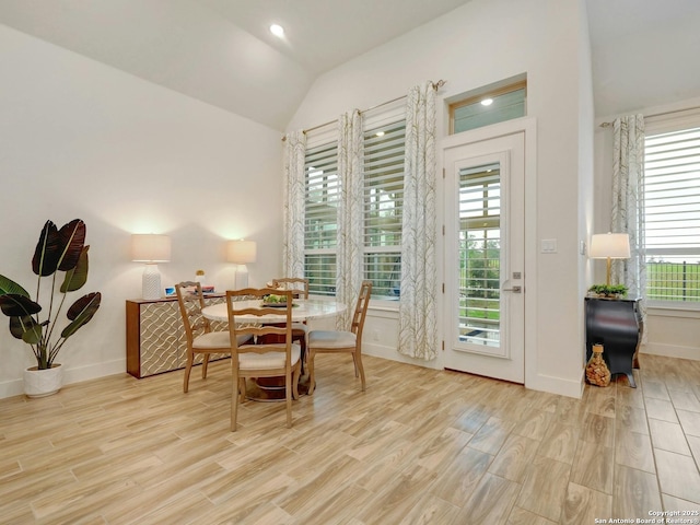 24742 Para Siempre, San Antonio, TX 78261 - dining space with baseboards, wood finished floors, and lofted ceiling